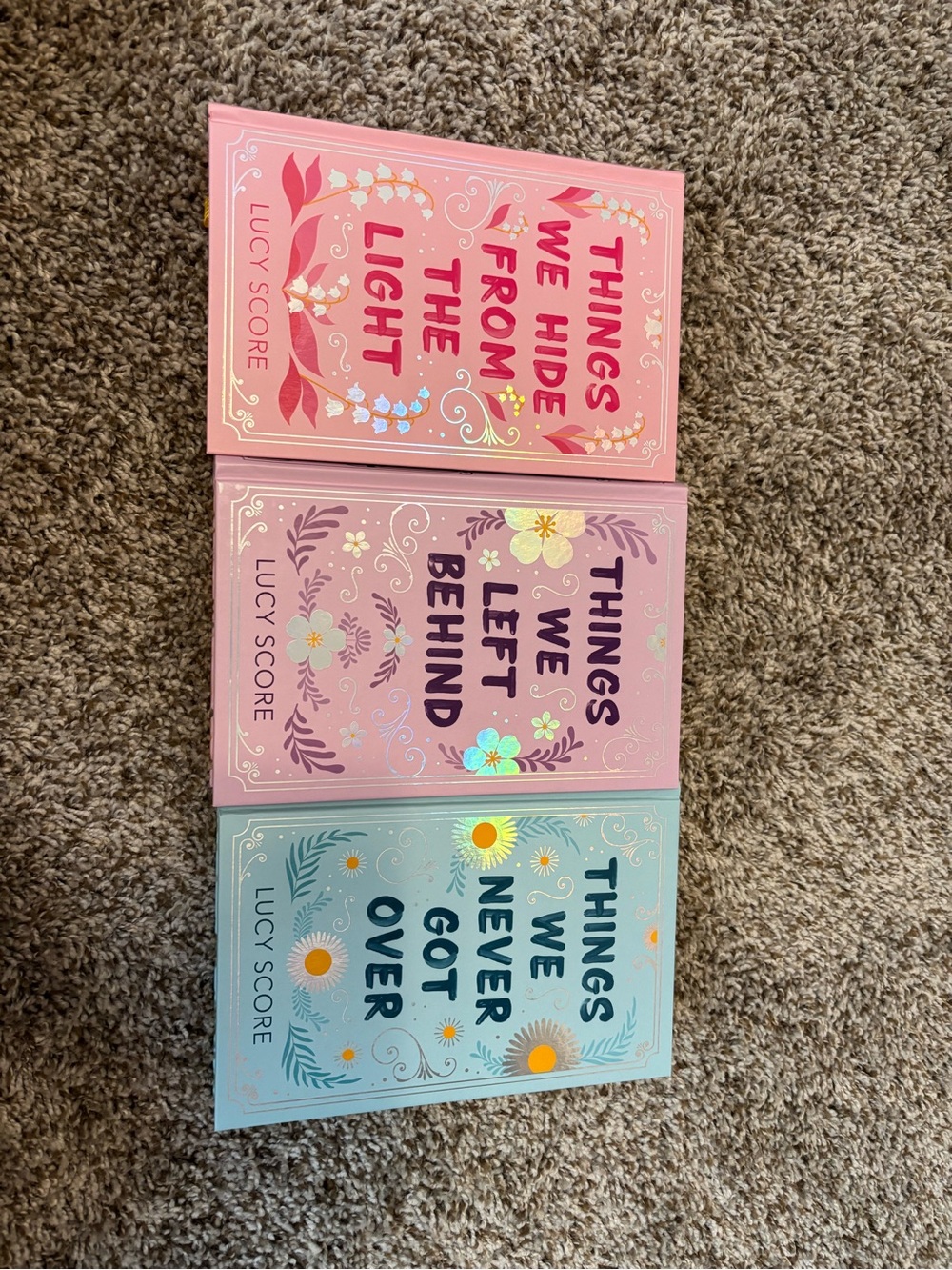 Knockemout Series Hardcover Book Set by Lucy Score - Pink, Lavender, Blue